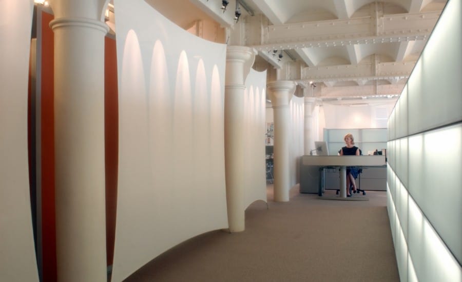 Acoustic fabric screens in an office space