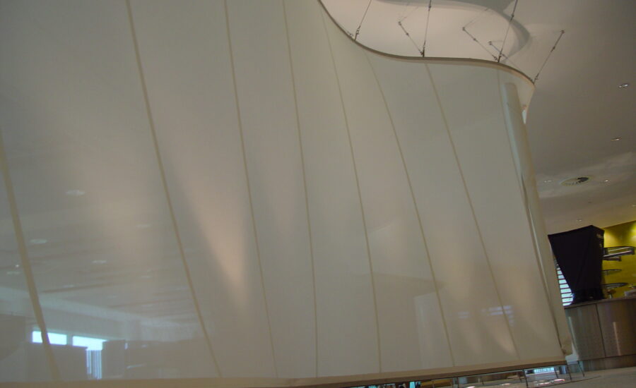 Detail of the stainless steel tension fixings on the BT Leavesden Park fabric screen rail