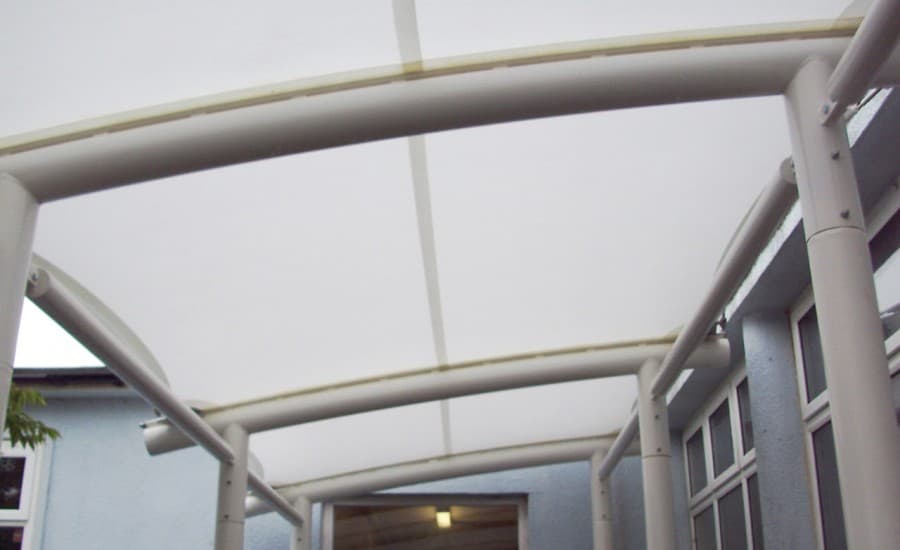 Fabric canopies covering outdoor space at a school