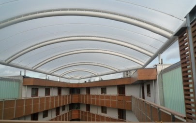 ETFE fabric roof over atrium space in apartment building