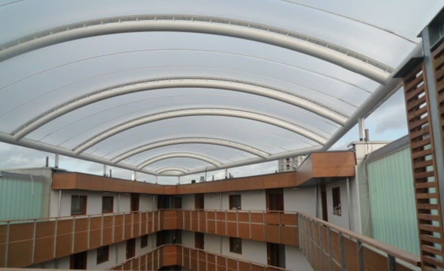 ETFE fabric roof over atrium space in apartment building