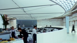 Fabric shade over restaurant ceiling