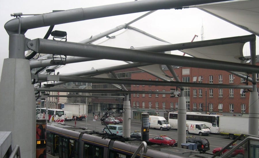 Tensile fabric canopy over tram station