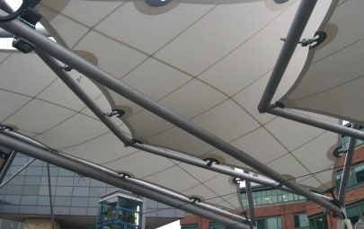 Arrow shaped fabric canopies