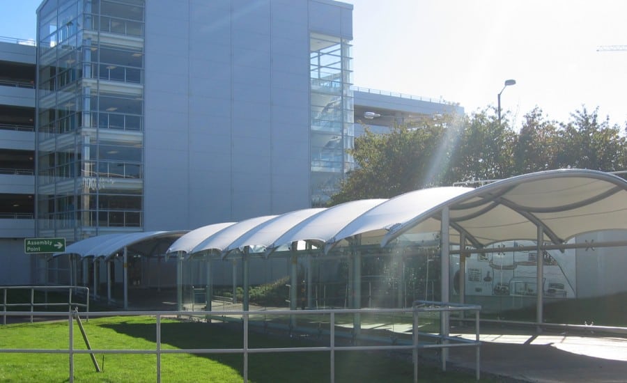 Curved tensile fabric walkway