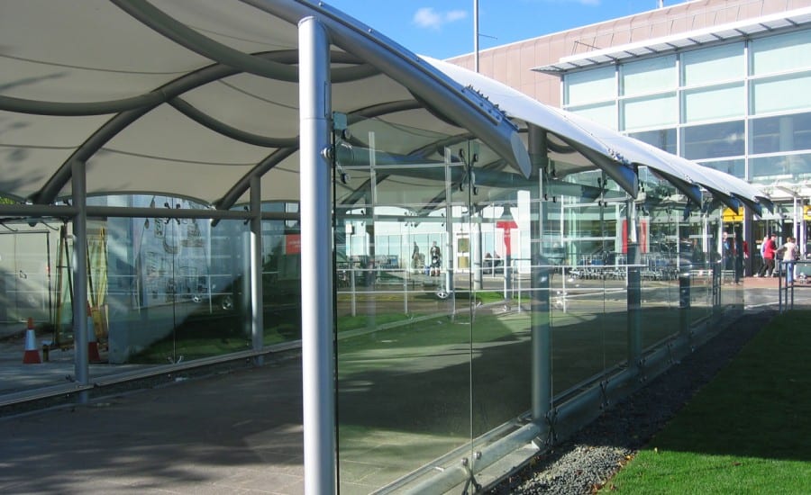 Tensile fabric shletered walkway