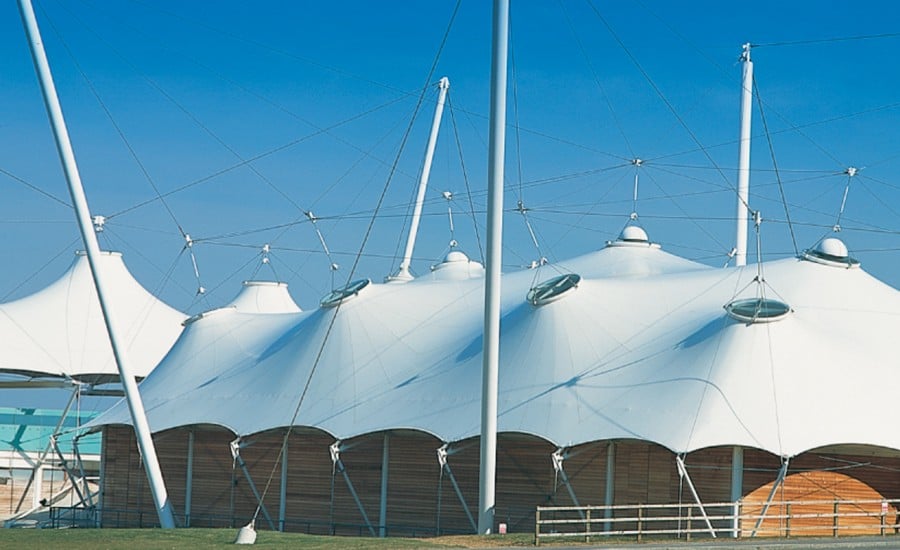 White tensile canopies covering buildings