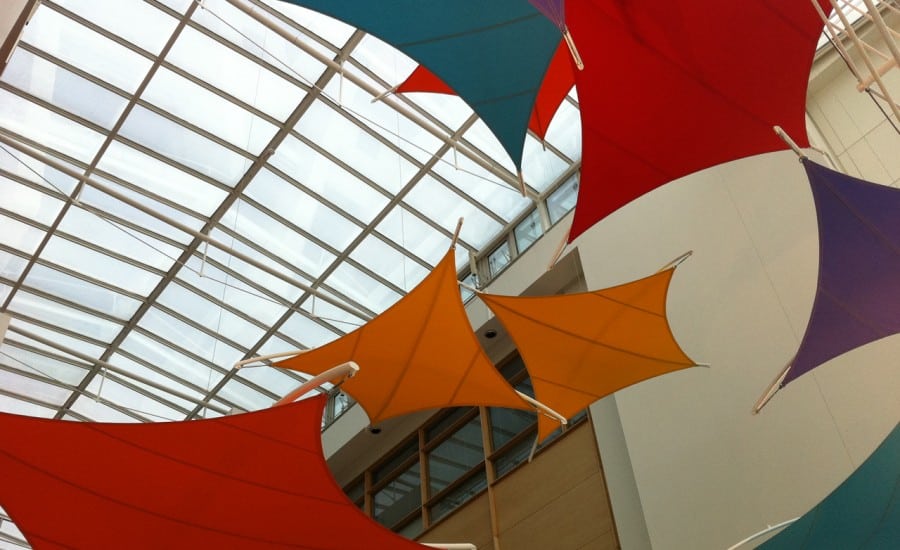 Interior tensile fabric shades