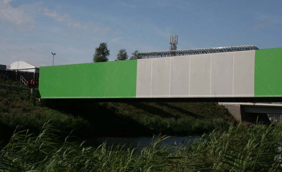 Bridge clad in coloured tensile fabric