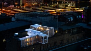 Clear fabric rooftop building