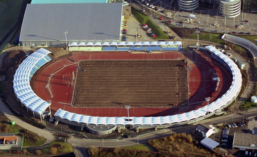 Tensile fabric canopy lined athletics stadium 