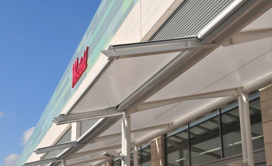 Slopping fabric canopies at bus station