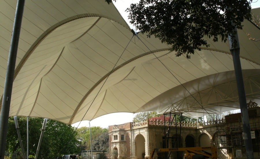 Tensile fabric canopy over Grade 1 listed building