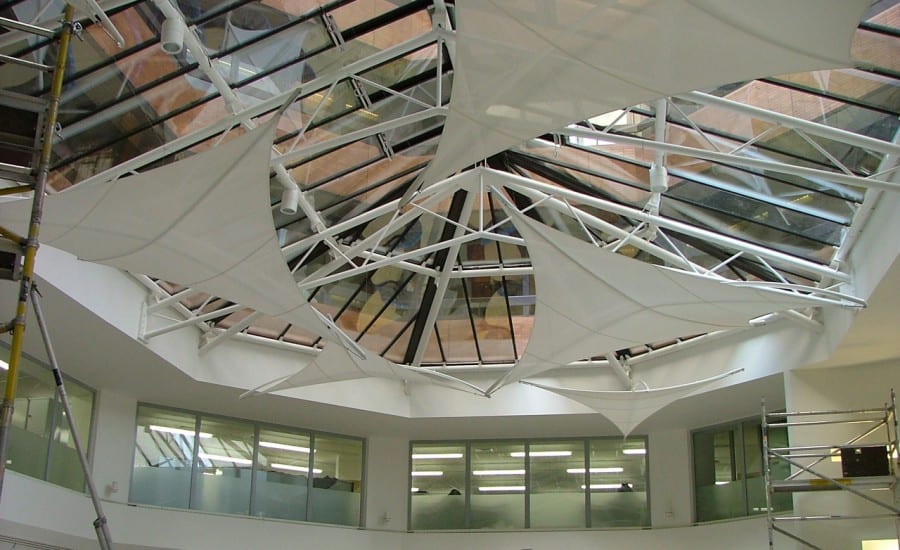 Interior fabric solar shades for offices