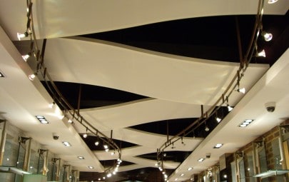 Suspended wave ceiling panels