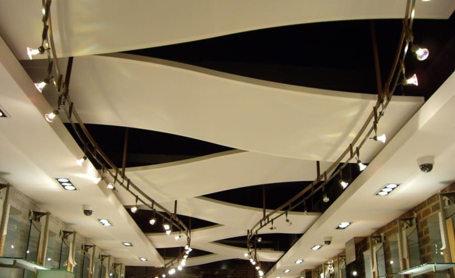 Suspended wave ceiling panels