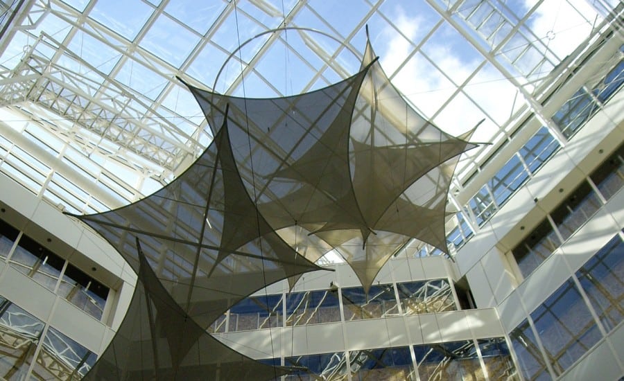 Shade providing tensile fabric shapes