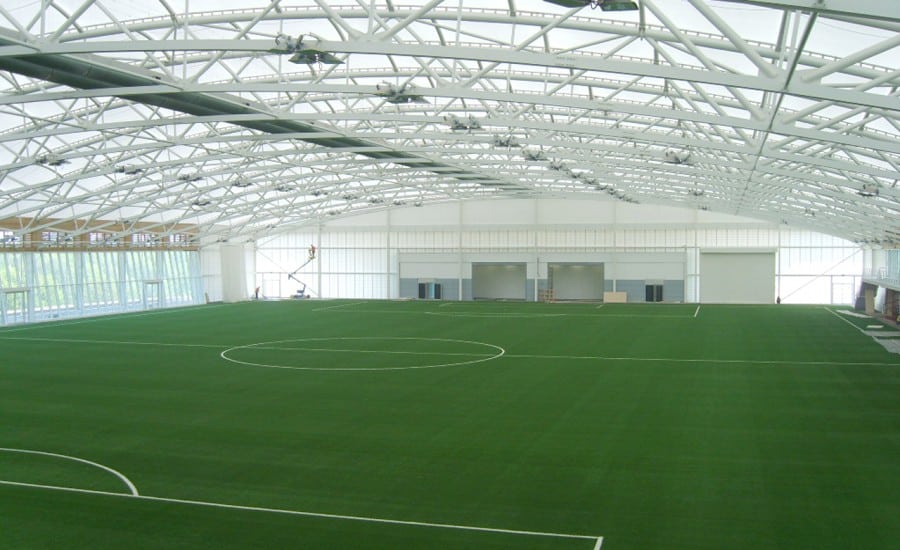 Football pitch covered by large tensile roof