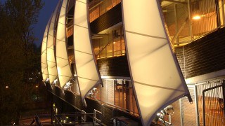 Tensile fabric feature sails for car park