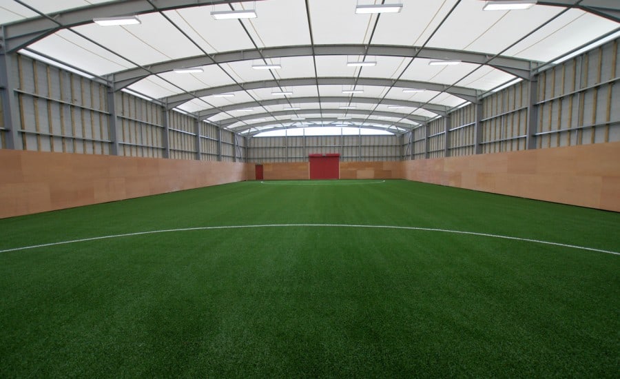 Tensile fabric roof structure over training ground