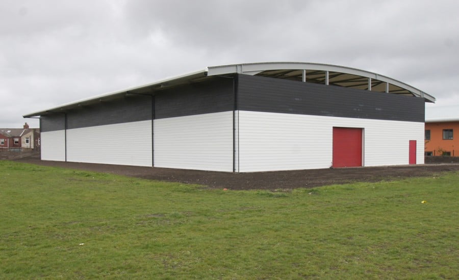 Tensile fabric roof covering training ground