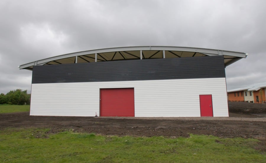 Fabric roof over sports facility