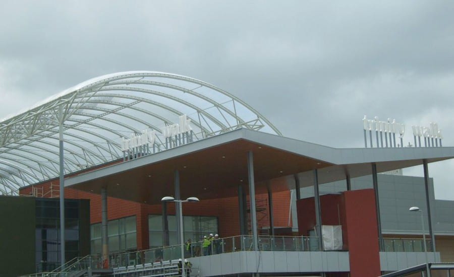 Clear tensile fabric roof covering shopping centre