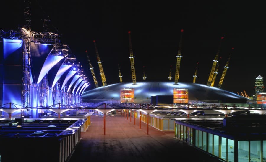 Fabric building with conic canopies