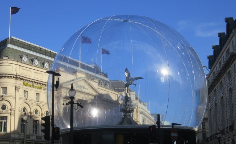 Inflatable fabric snow globe