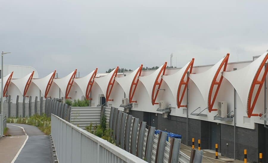 Tensile fabric sails