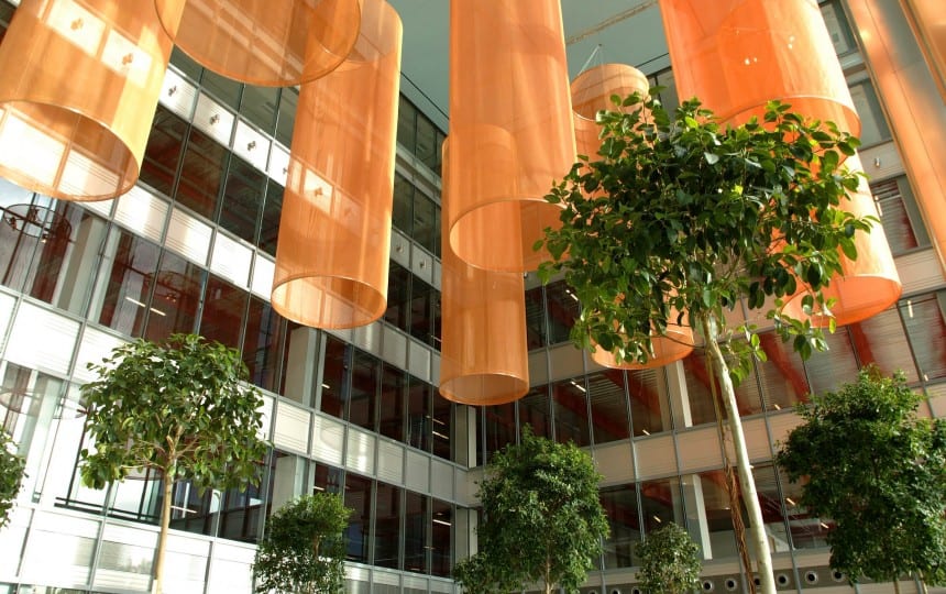 internal fabric feature mesh cylinders with integrated LED lighting for acoustics and solar control