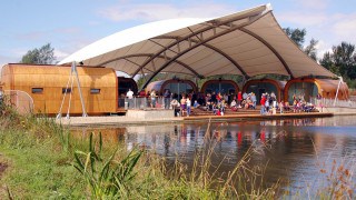 outdoor public space covered by tensile fabric archway