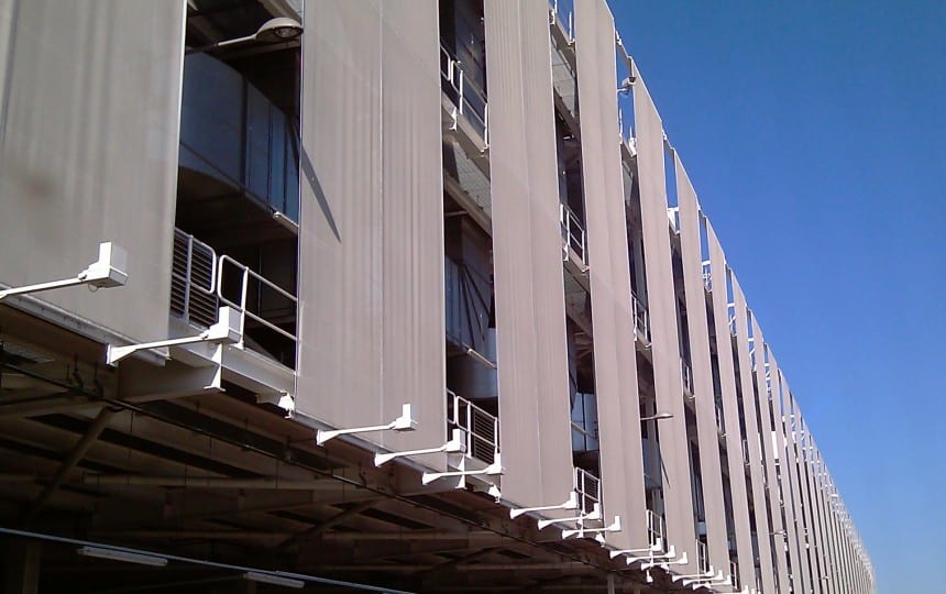 Tensile fabric banner cladding