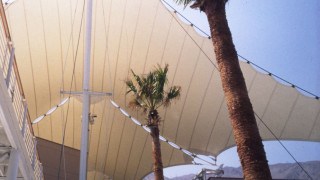 Shopping mall tensioned fabric membrane roof