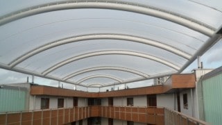 Single layer ETFE foil in barrel vault canopy