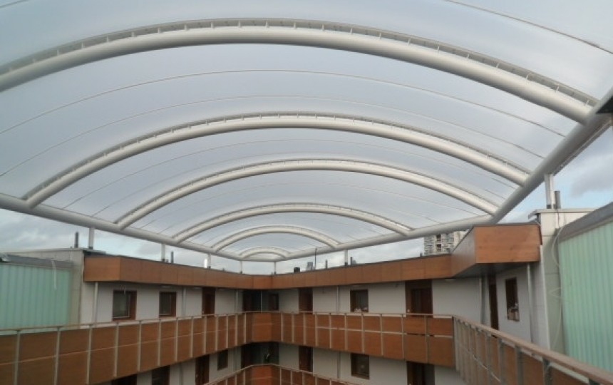 Single layer ETFE foil in barrel vault canopy